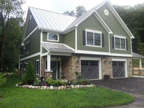 green vinyl house with a green metal roof|green vinyl home designs.